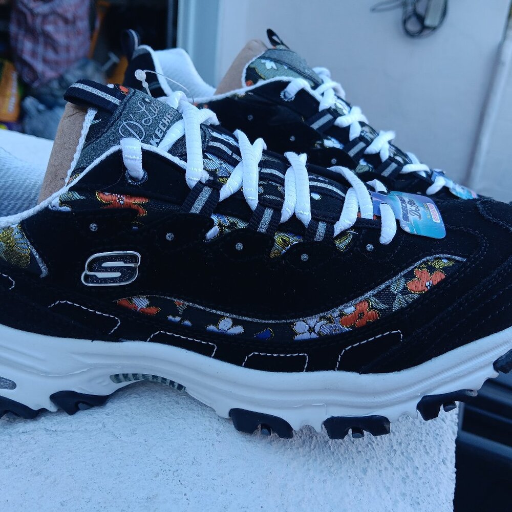 Black/floral skechers shoes. Never used